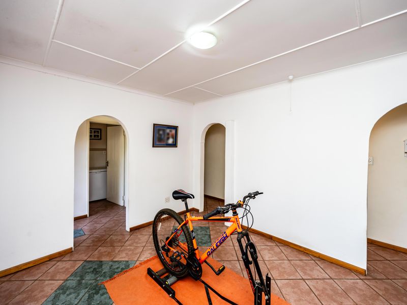 Ideal Family Home with Covered Patio, Pool, and Additional Flatlet - Photo 5