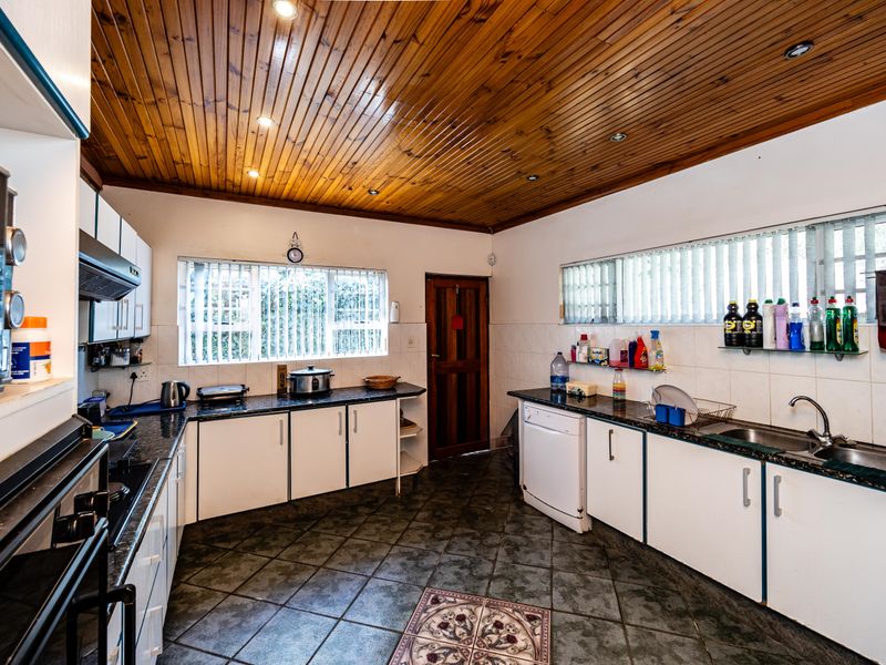 Ideal Family Home with Covered Patio, Pool, and Additional Flatlet - Photo 6