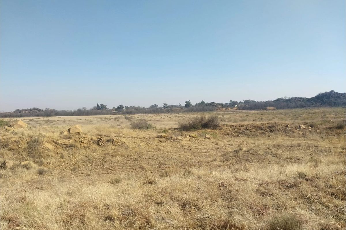 An expansive view of the open veld landscape on the small holding, showcasing the natural terrain and surrounding rural scenery.