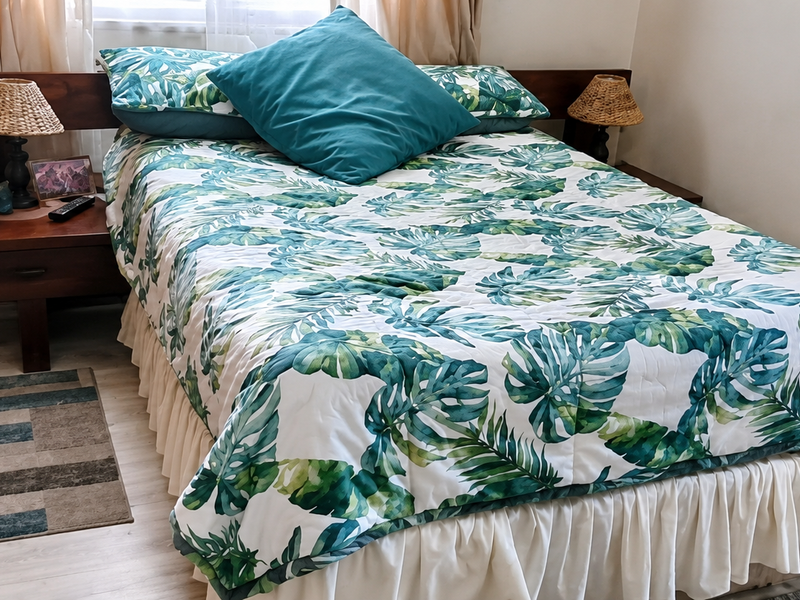 A well-maintained bedroom featuring light-toned laminate flooring and a custom built-in wooden headboard with integrated side tables.