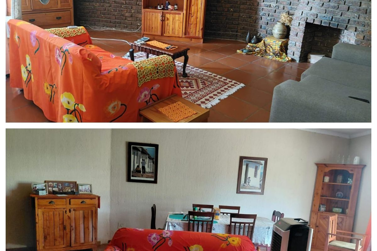 A living room featuring a rustic brick fireplace and terracotta floor tiles, offering a traditional aesthetic with potential for modern updates.