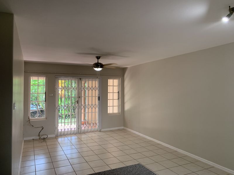 Sunny Coastal Ground Floor Setting - Photo 9