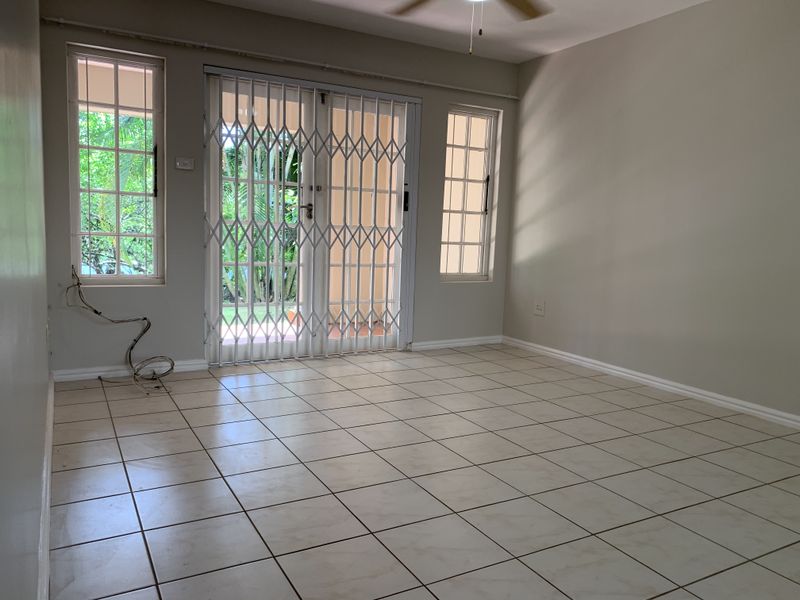 Sunny Coastal Ground Floor Setting - Photo 8