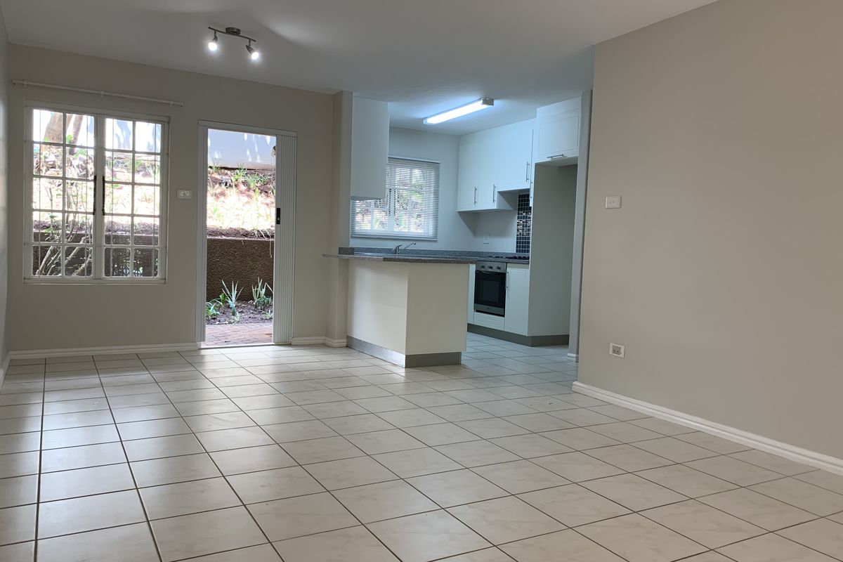 Sunny Coastal Ground Floor Setting - Photo 4
