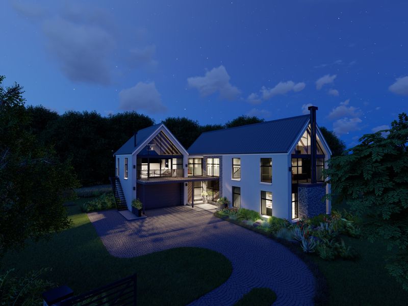 A modern architectural residential property featuring a paved driveway, stone accents, metal roofing, and a spacious balcony, captured at twilight.