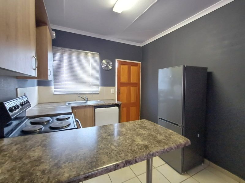 Charming 2-bedroom sectional title in The Orchards, Akasia—perfect for modern living and convenienc - Photo 3