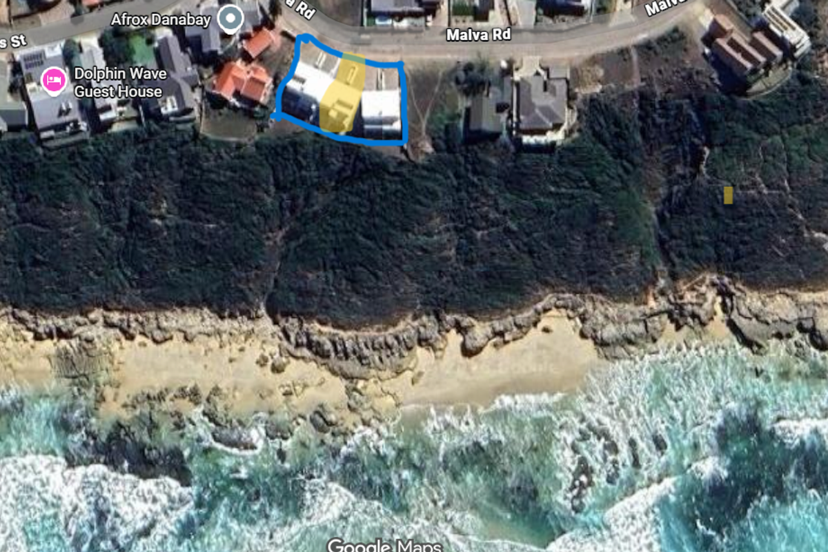 Aerial view showing the property location in relation to the coastline and surrounding street infrastructure.