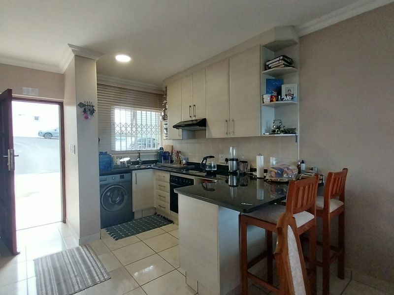 Modern 2-Bedroom Ground Floor Unit with Stunning Sea Views – Steps from Lucien Beach - Photo 4