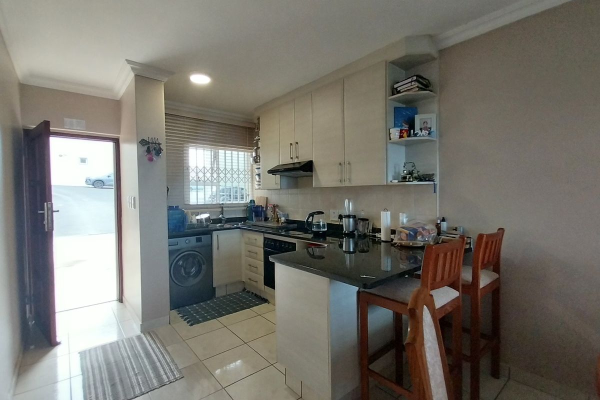 Modern 2-Bedroom Ground Floor Unit with Stunning Sea Views – Steps from Lucien Beach - Photo 4