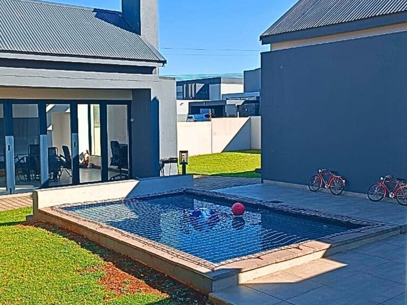 Modern 4-Bedroom Home for Sale in Midstream Meadows - Photo 10