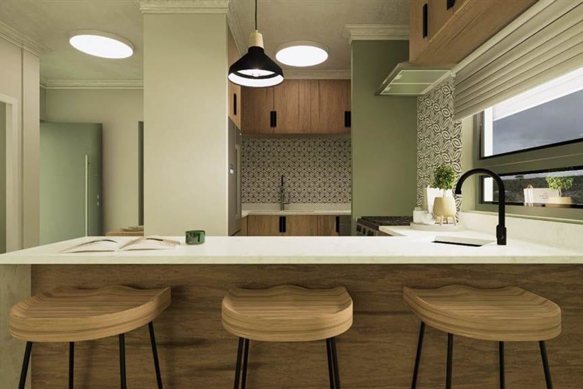 Modern kitchen featuring a breakfast bar, wood-finish cabinetry, patterned tile backsplash, and integrated lighting, creating a stylish and functional culinary space.