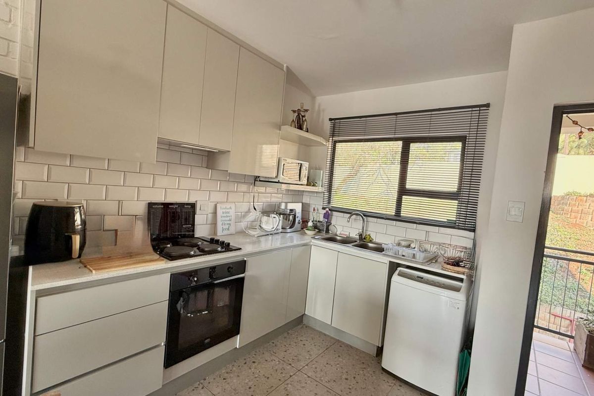 Modern 2-Bedroom Apartment – Ideal Starter Home or Investment Opportunity - Photo 5