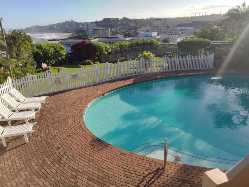 This stylish  ground-floor apartment offers comfortable living in a prime location - Photo 2