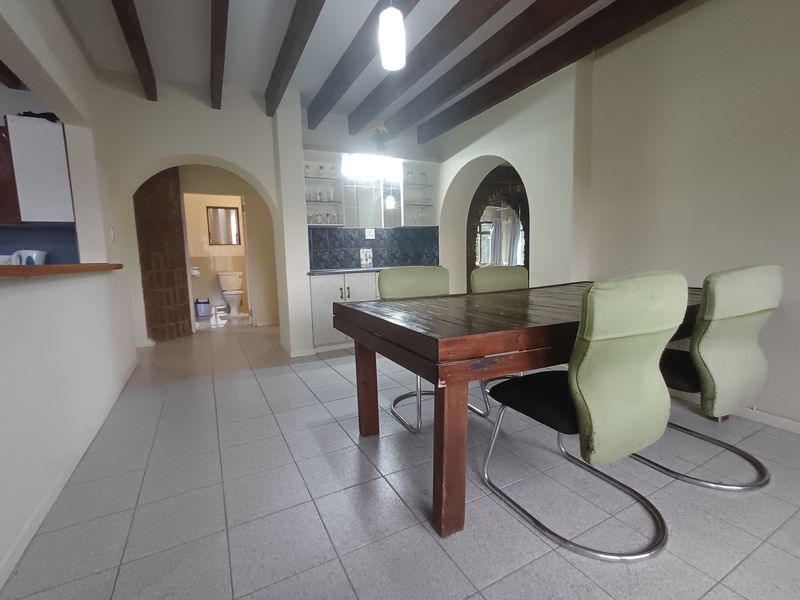 Exceptional Three-Level Ramsgate Residence with 2 Flatlets, Indoor Pool & Ample Space - Photo 10