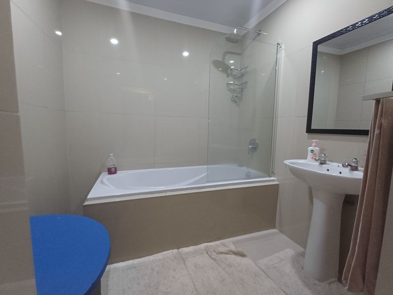 Exceptional Three-Level Ramsgate Residence with 2 Flatlets, Indoor Pool & Ample Space - Photo 7