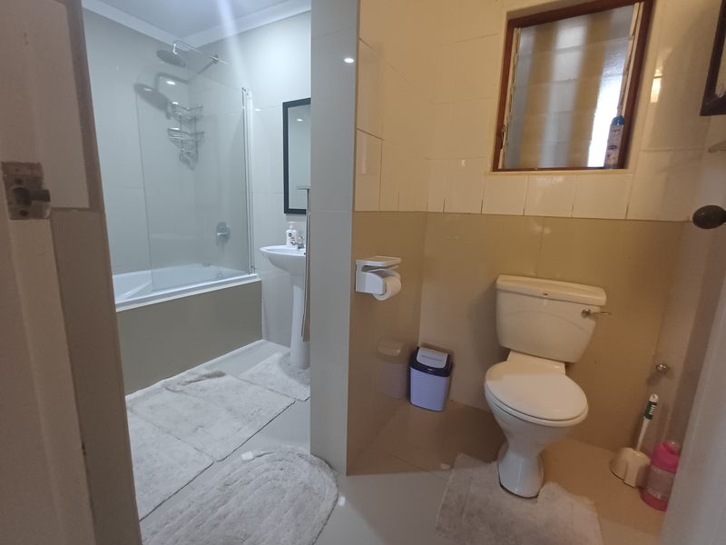 Exceptional Three-Level Ramsgate Residence with 2 Flatlets, Indoor Pool & Ample Space - Photo 6