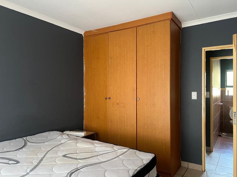 Charming 3-bedroom townhouse to let - perfect for comfortable family living! - Photo 6