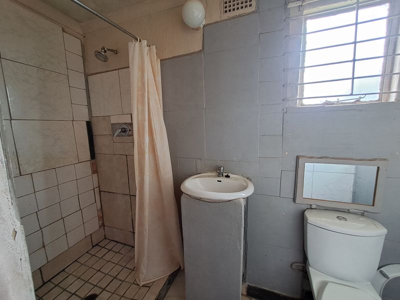 3-Bedroom Home with 7 Income-Generating Rental Units - Photo 10