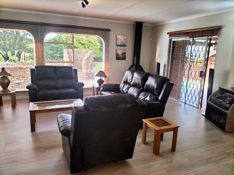 Stunning 4-Bedroom Home with Pool, Patio, and Lovely View - Photo 6