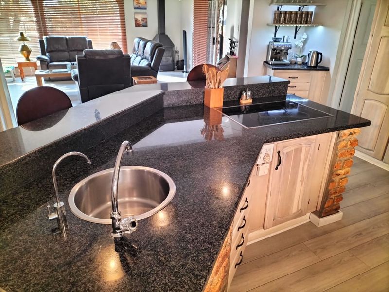 Stunning 4-Bedroom Home with Pool, Patio, and Lovely View - Photo 8