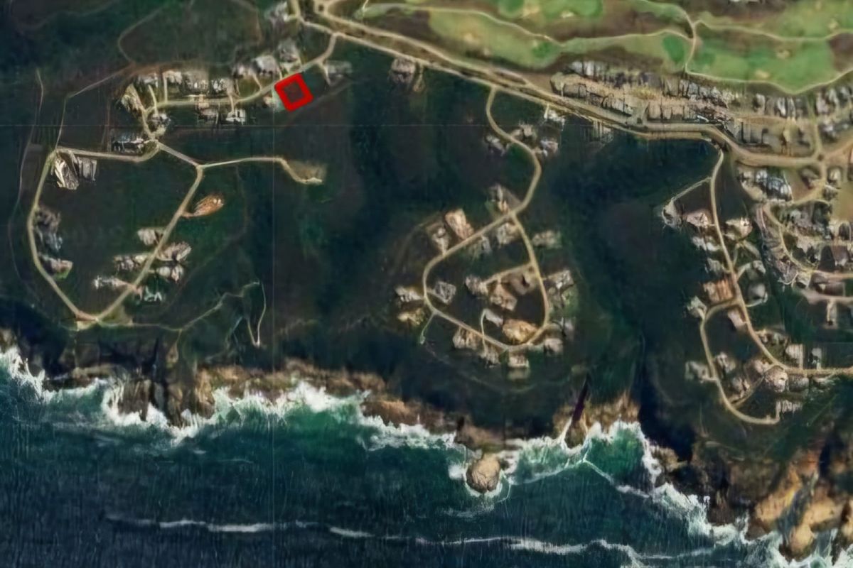 Aerial view of the residential estate showing the location of the vacant land plot highlighted in red.