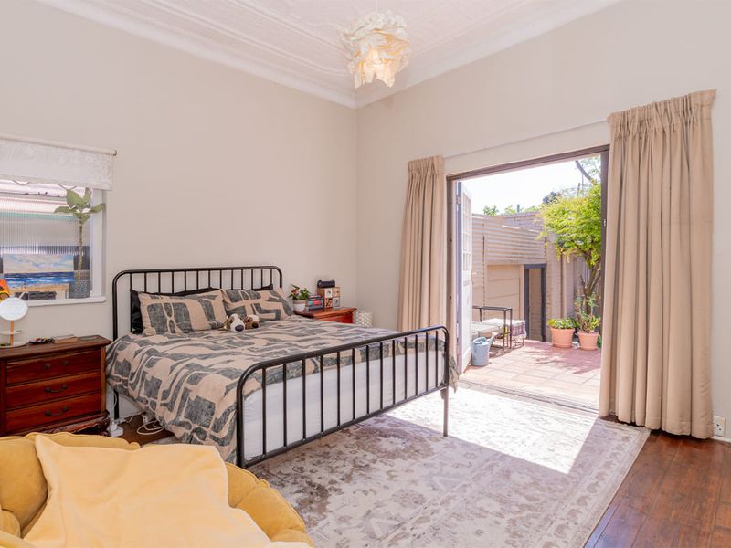 Modern 3-Bedroom Character Home with Self-Contained Cottage - Photo 7