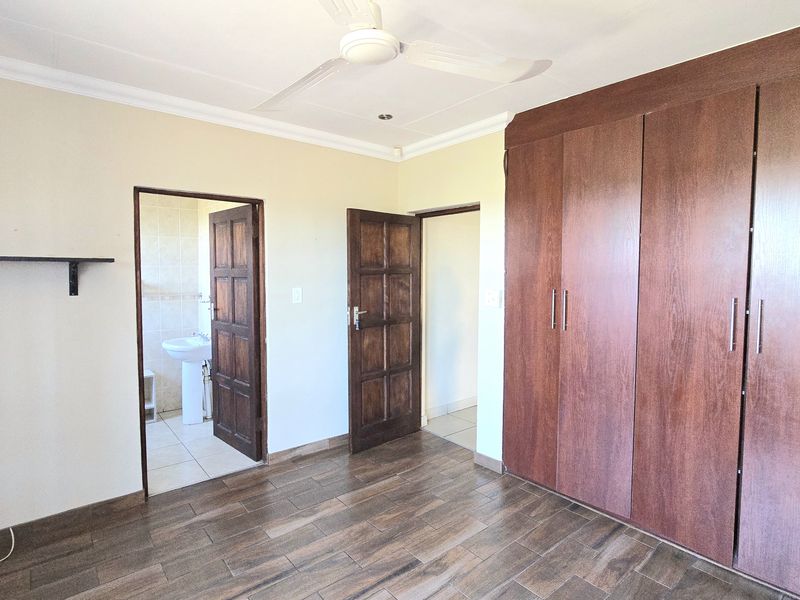 Spacious 4-Bedroom Home in Secure, Family-Friendly Complex. - Photo 6