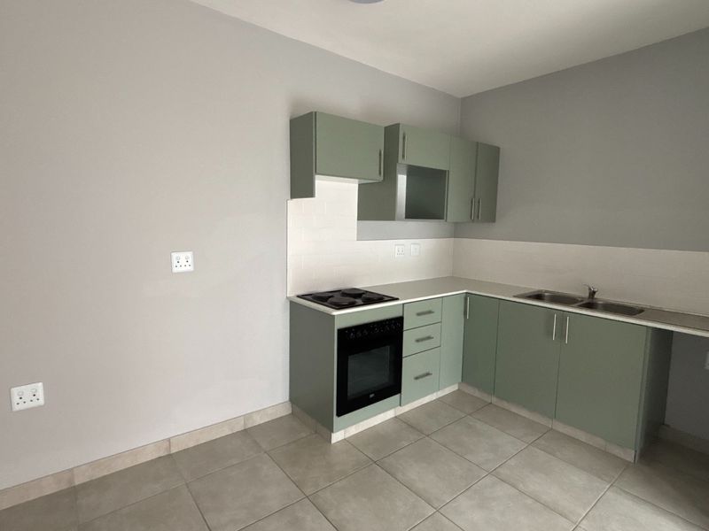 Modern One-Bedroom Apartment in Forest Waters Lifestyle Estate Secure Living with Scenic Views - Photo 2