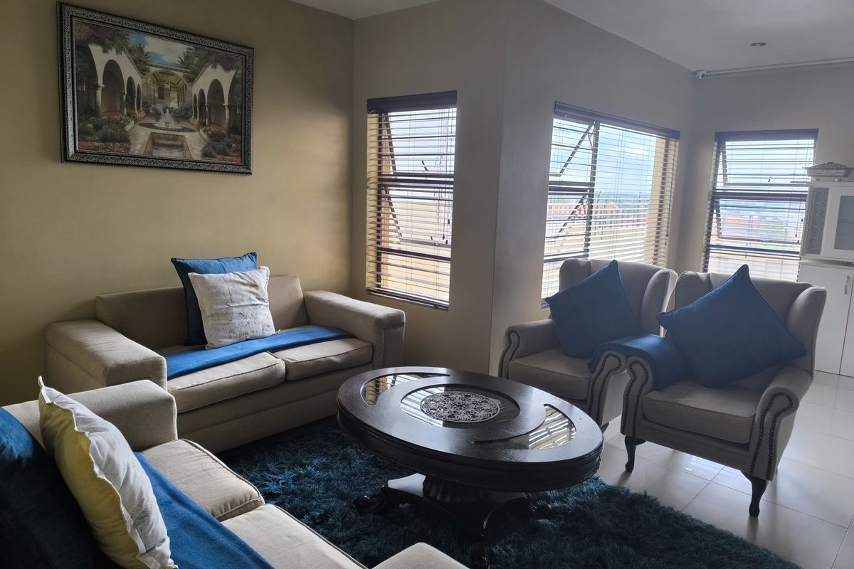 Elegant Living in a Secure Gated Complex - Photo 2