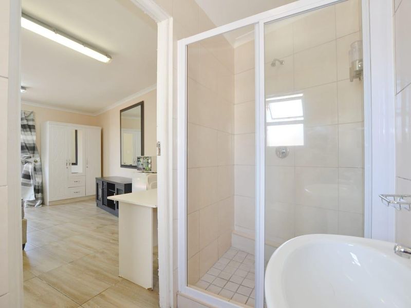 This unit forms part of a house with communal yard space and parking - Photo 6