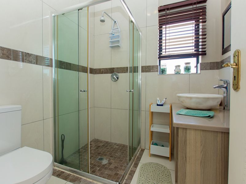 Experience Coastal Luxury Like Never Before: 5-Bedroom Home with Unmatched Lagoon Views - Photo 10