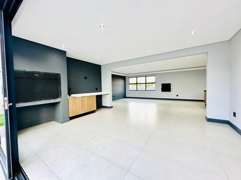 Elegant Double-Story Home with Pool & Boma in Sought-After Midstream Heights - Photo 9