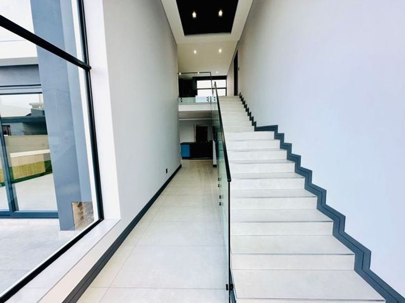 Elegant Double-Story Home with Pool & Boma in Sought-After Midstream Heights - Photo 7