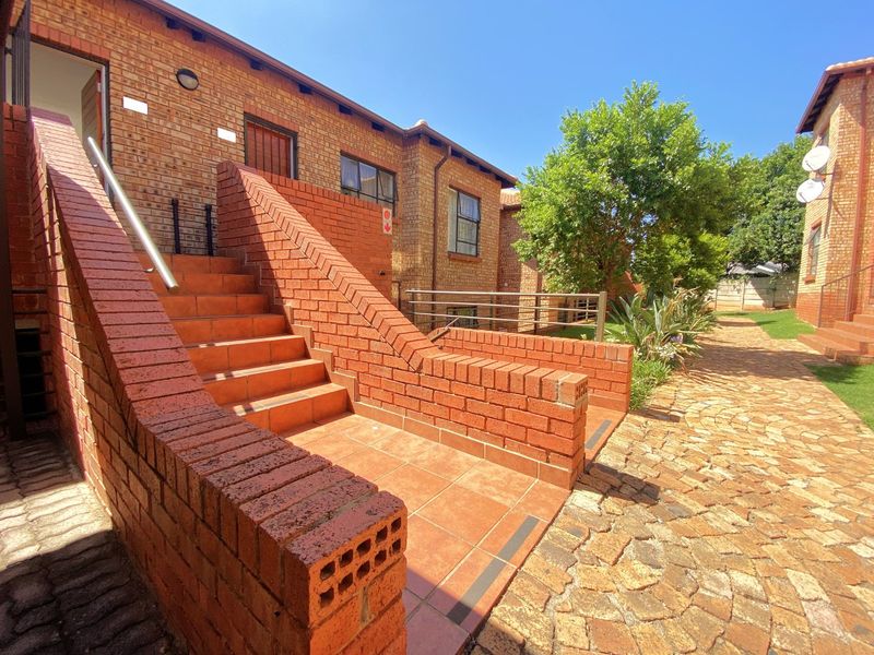 View from unit - Clubhouse with pool - Security - Photo 2
