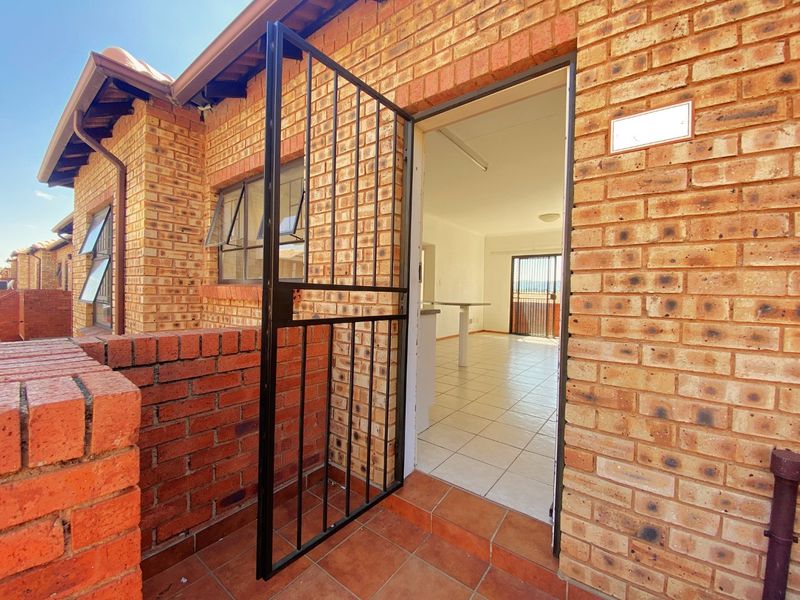 View from unit - Clubhouse with pool - Security - Photo 4