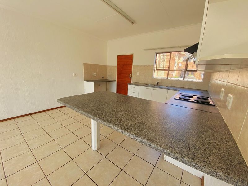 View from unit - Clubhouse with pool - Security - Photo 6