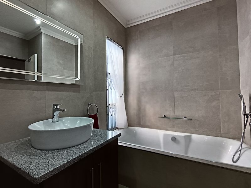 Modern two bedroom home in a secure complex - Photo 3