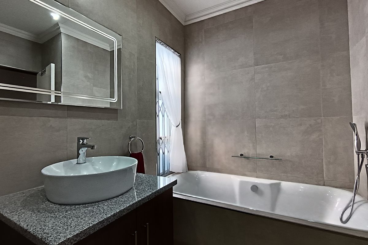 Modern two bedroom home in a secure complex - Photo 3