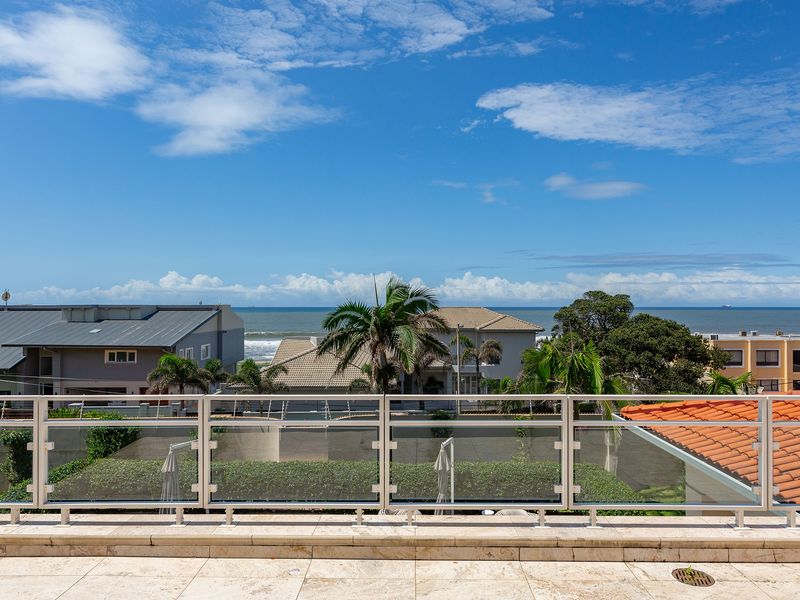 Luxury Beachfront Mansion – A Tropical Oasis of Elegance - Photo 4