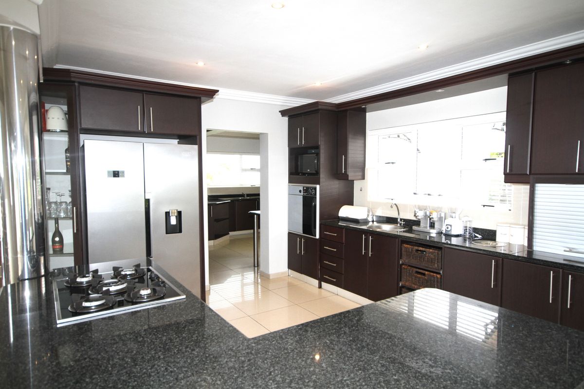 A Modern 5 Bedroom Masterpiece in a Gated Estate - Photo 3