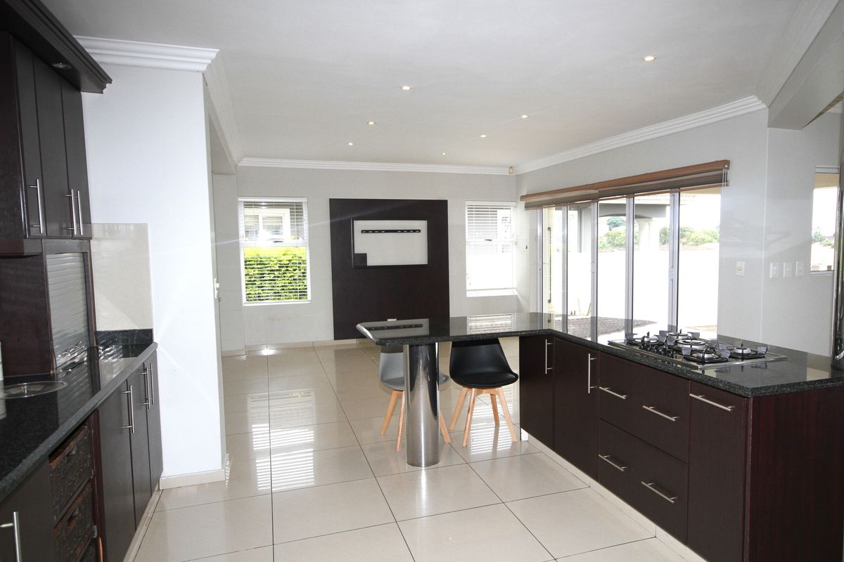 A Modern 5 Bedroom Masterpiece in a Gated Estate - Photo 4