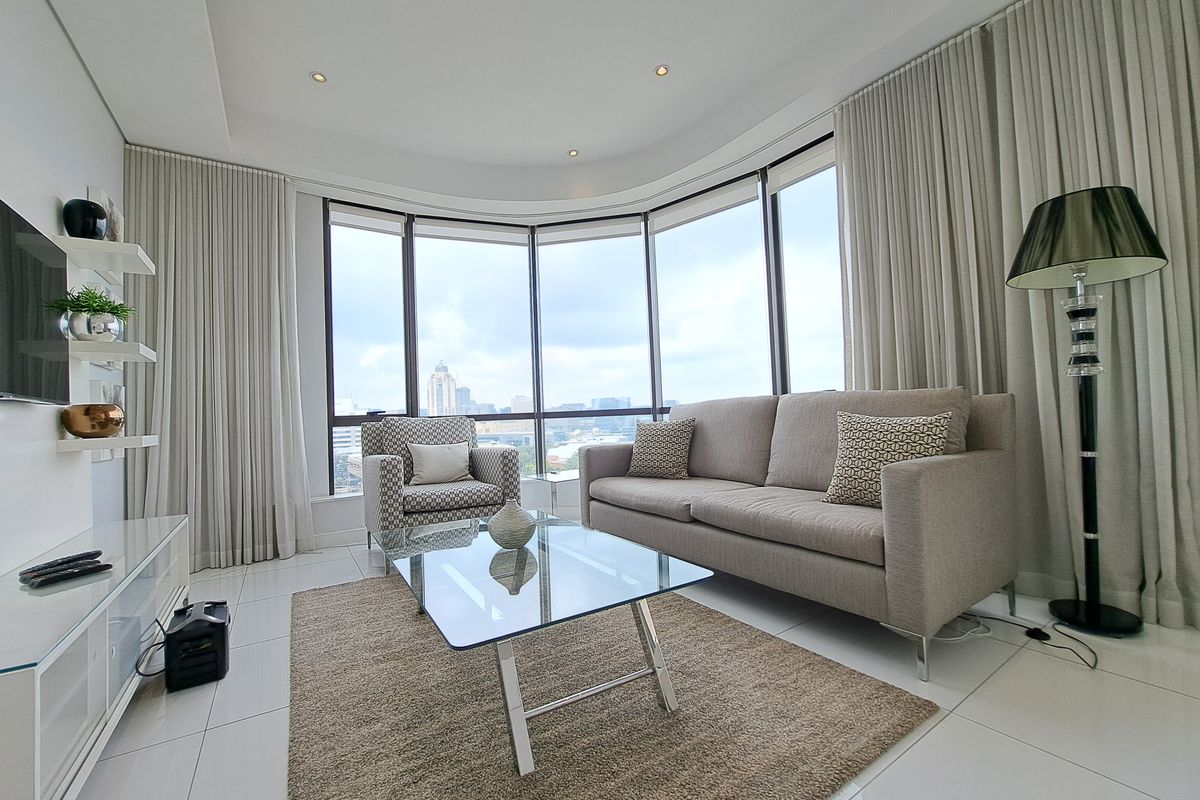 furnished 2-bedroom apartment in Sandton Skye - Photo 2