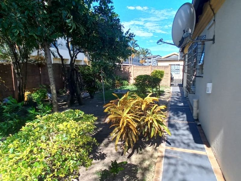 Stunning 3-Bedroom Family Home in Secure Complex - Your Dream Oasis Awaits - Photo 5