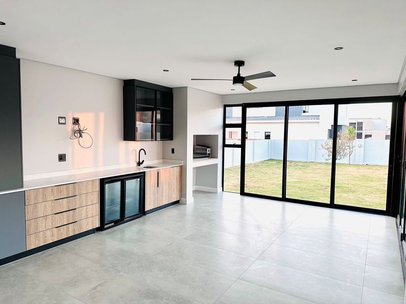 Stunning Double-Storey Home with Entertainment Flair in Midstream Heights - Photo 4