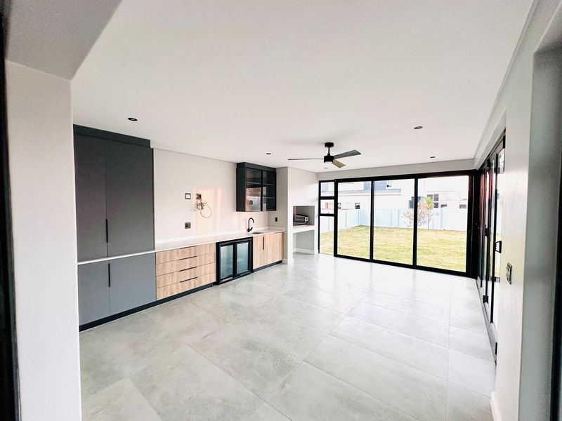 Stunning Double-Storey Home with Entertainment Flair in Midstream Heights - Photo 9