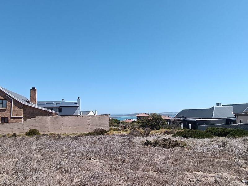 Your Lagoon View Awaits – Prime Plot for Your Dream Home - Photo 1