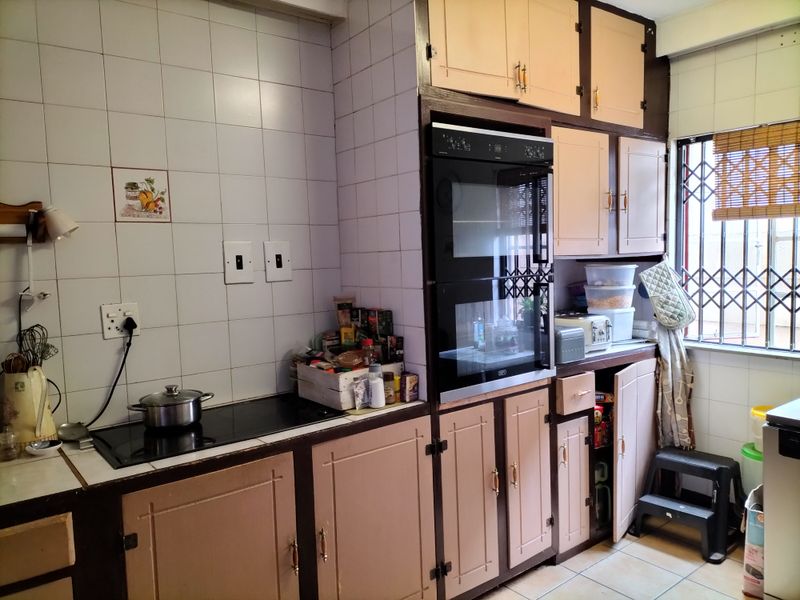 A solid home combining charm and practical features. - Photo 2