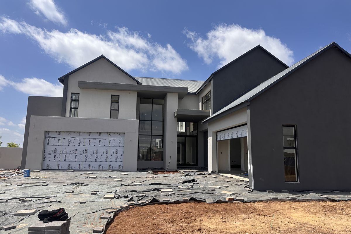 Modern Double-Story 5 Bedroom Home in Midstream Heights with a Cinema Room - Close to completion. - Photo 2