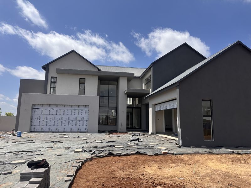 Modern Double-Story 5 Bedroom Home in Midstream Heights with a Cinema Room - Close to completion. - Photo 2