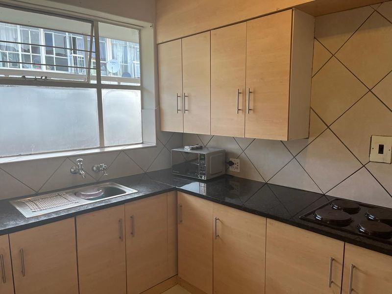 Spacious two bedroom unit in a tranquil complex - Photo 2